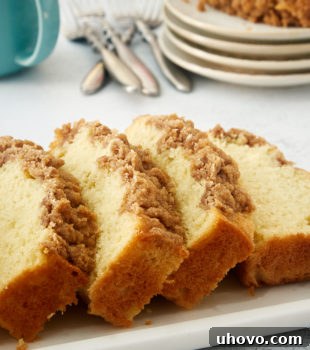 slices of Sour Cream Coffee Cake on a white tray