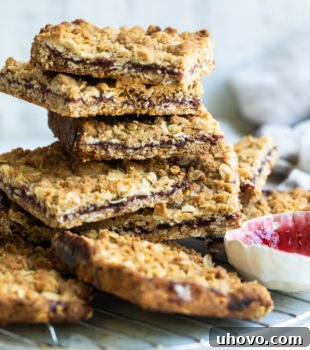 Raspberry Bars stacked on a wire rack