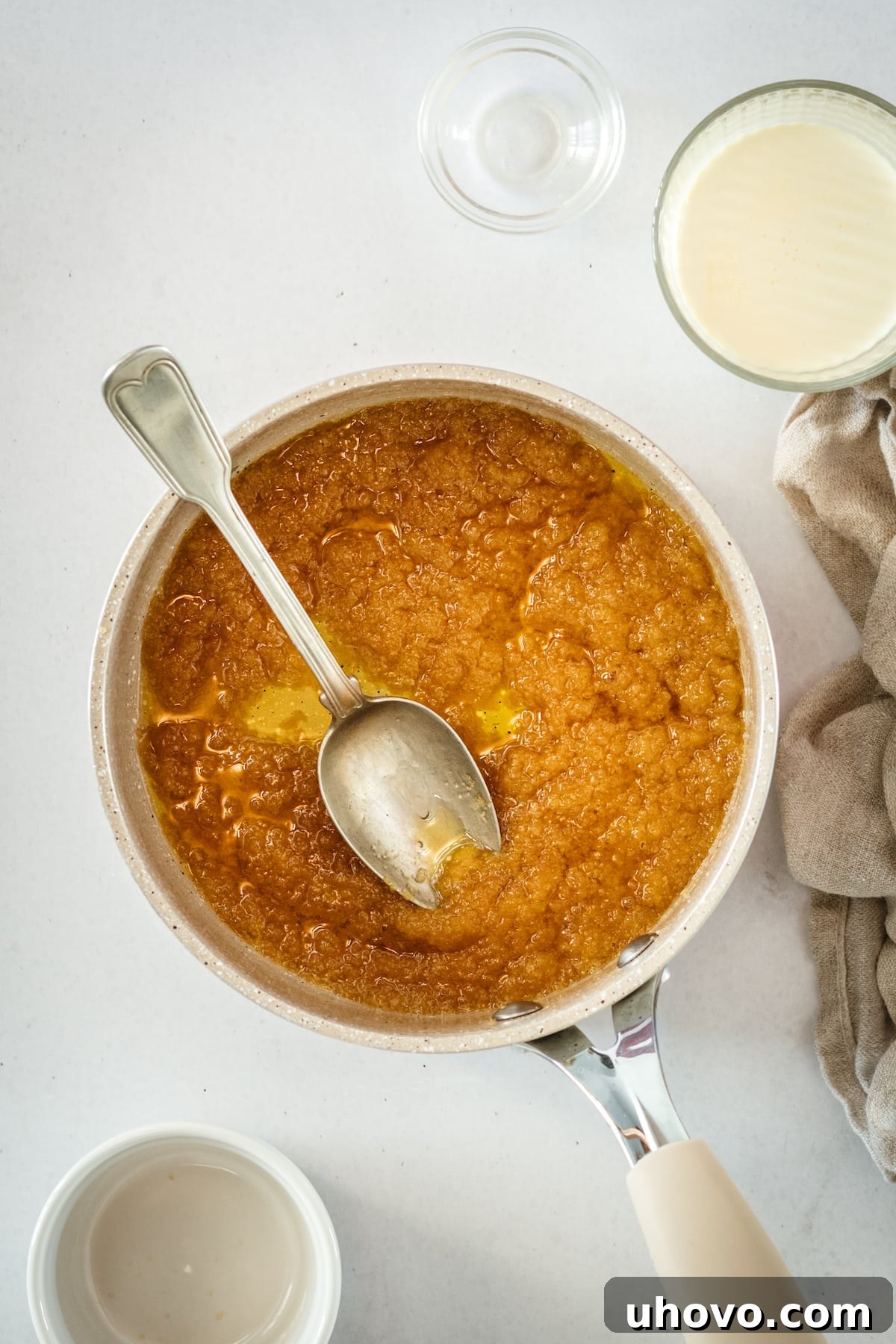 Overhead view of butterscotch being cooked in saucepan