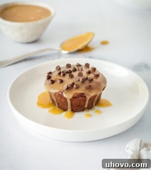 Plated mini chocolate pound cake glazed with butterscotch and topped with chocolate chips