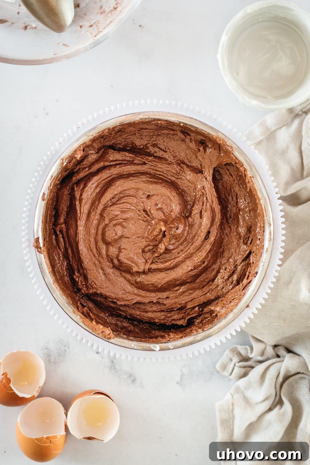 Overhead view of chocolate pound cake batter in mixing bowl