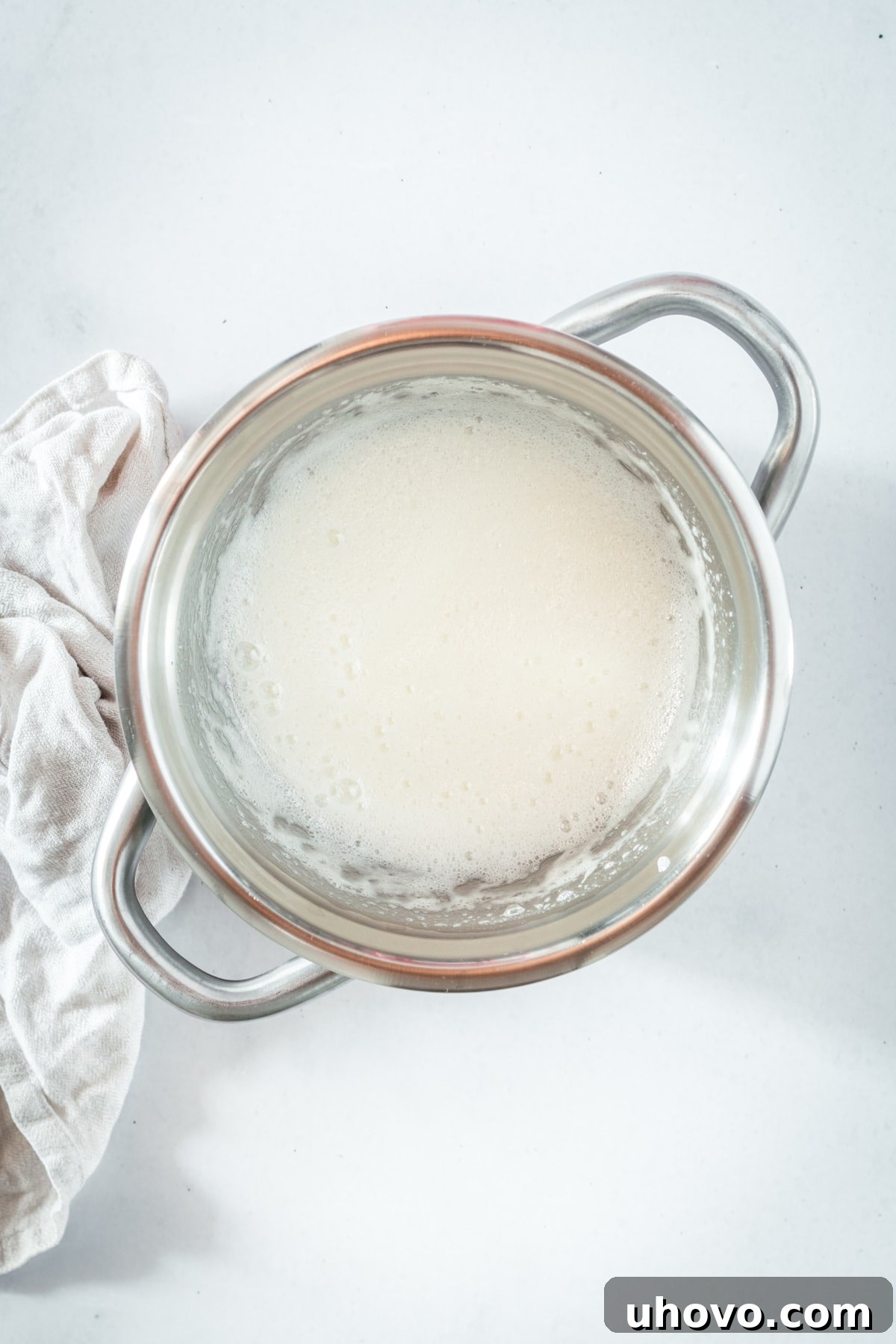 Overhead view of meringue in double boiler