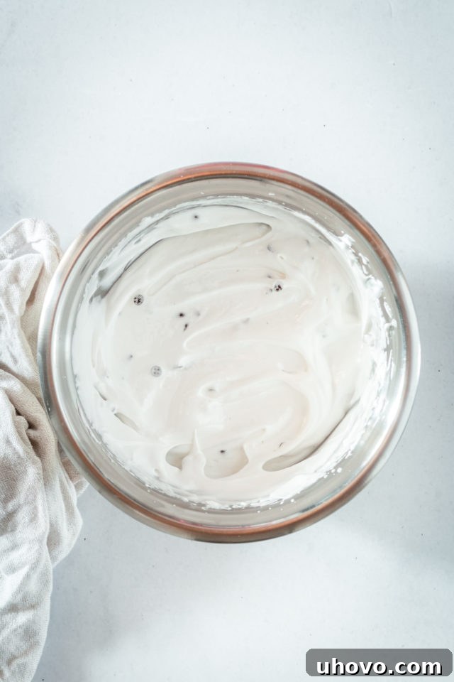Overhead view of chocolate chip Swiss meringue in bowl