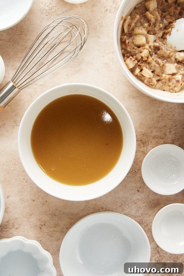 overhead view of mixed pudding mixture for pear pudding cakes