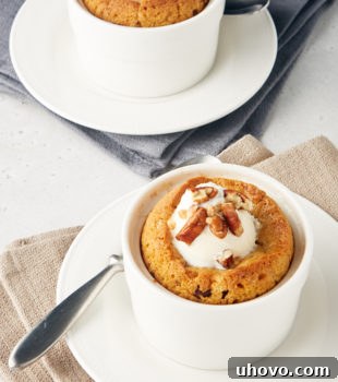 Deep Dish Chocolate Chip Cookies for Two served on white plates on top of beige and gray napkins