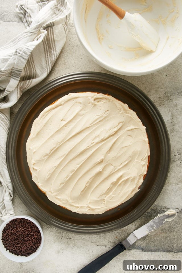 The fully frosted Irish Cream Cake, beautifully adorned and ready to be sliced and enjoyed.
