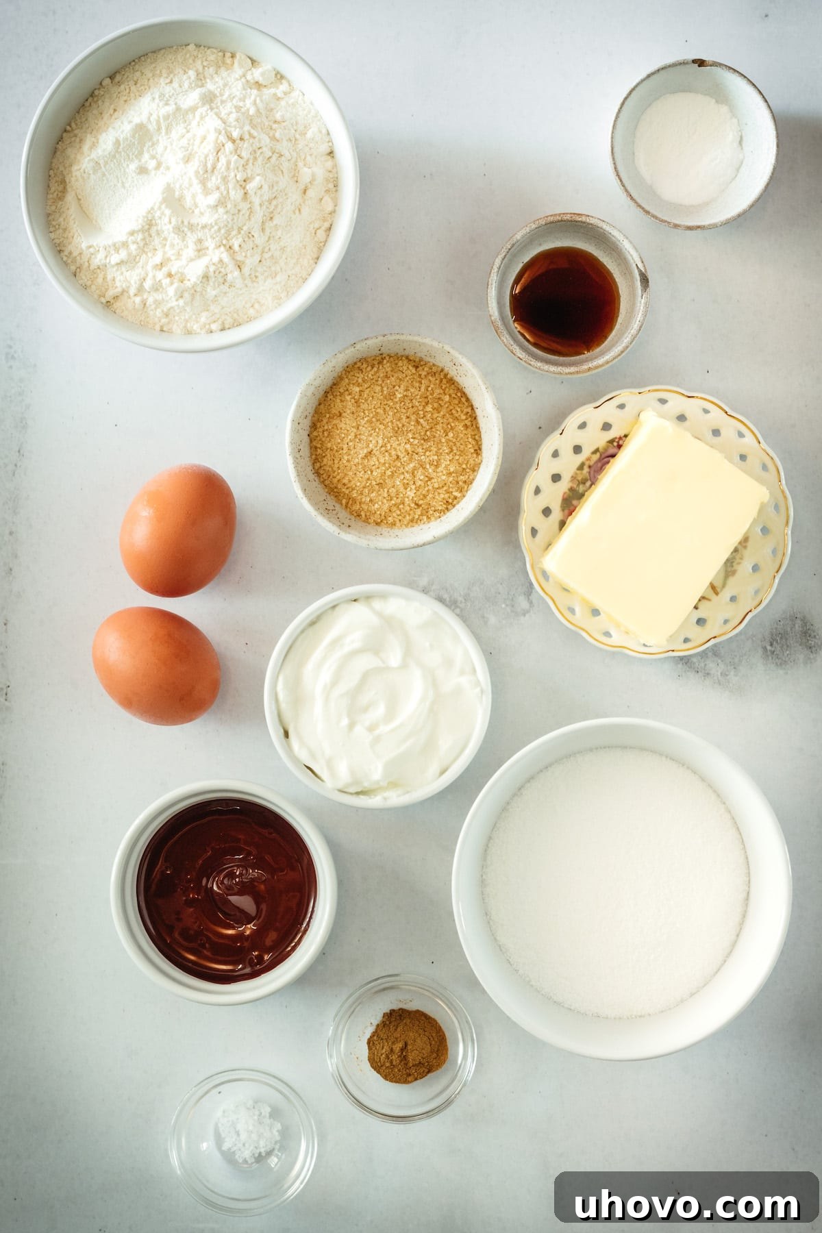 Overhead view of Chocolate Swirl Coffee Cake ingredients laid out on a baking surface.