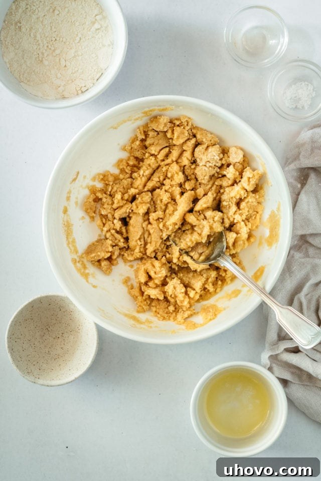 Overhead view of the finished crumb topping in a bowl, ready to be added to the coffee cake.