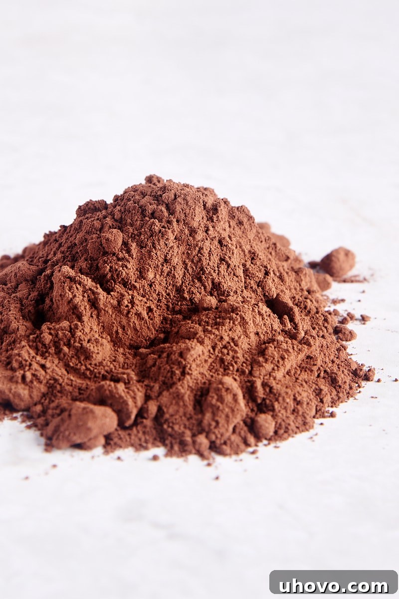 pile of cocoa powder on a white surface