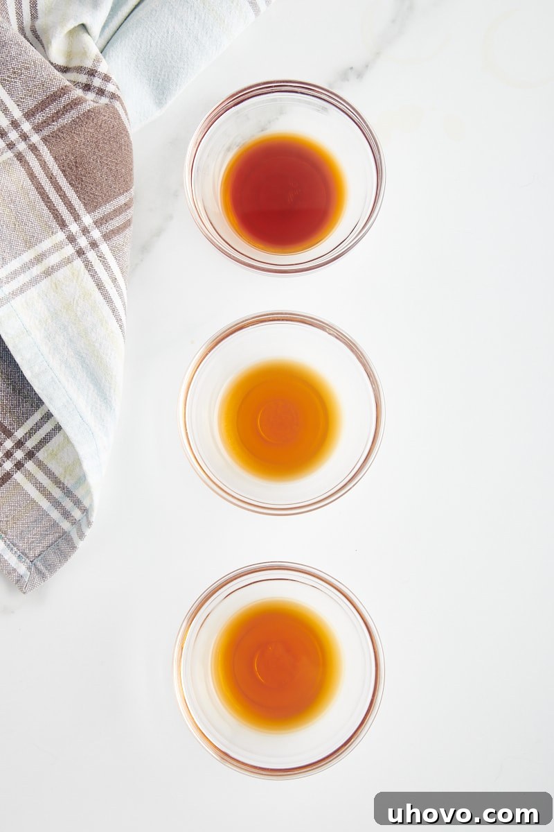 overhead view of Madagascar, Mexican, and Tahitian vanilla in glass bowls