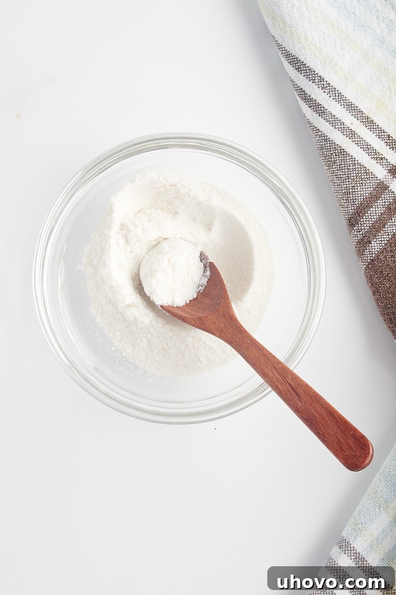 overhead view of vanilla powder in a white bowl