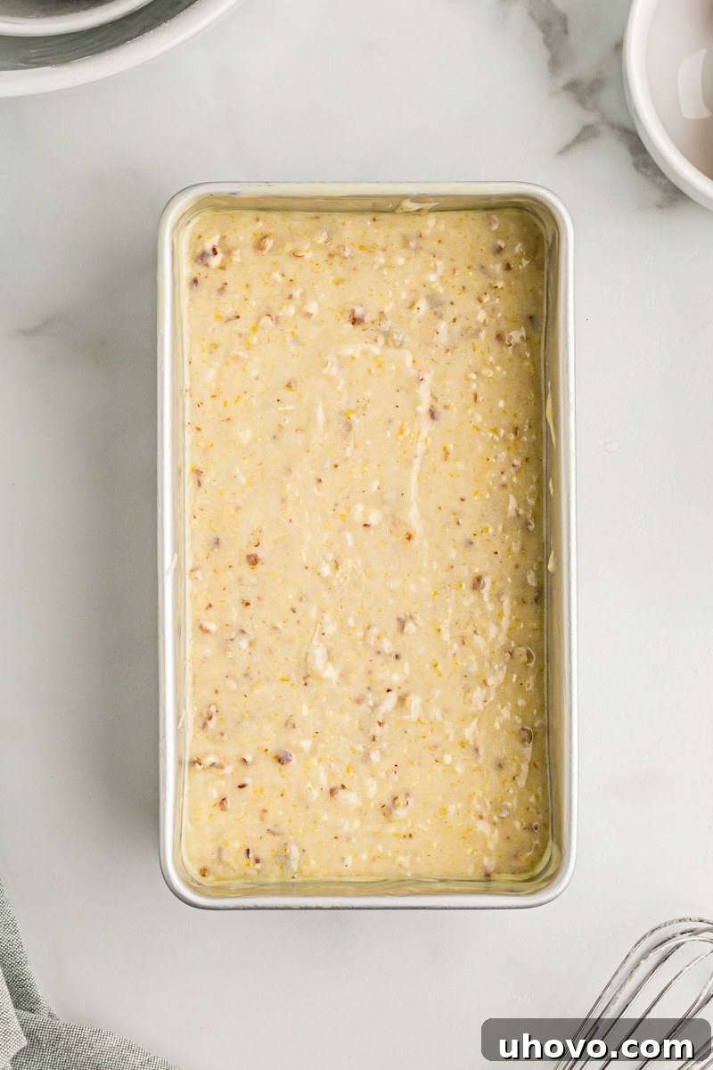 Overhead view of lemon bread batter in pan