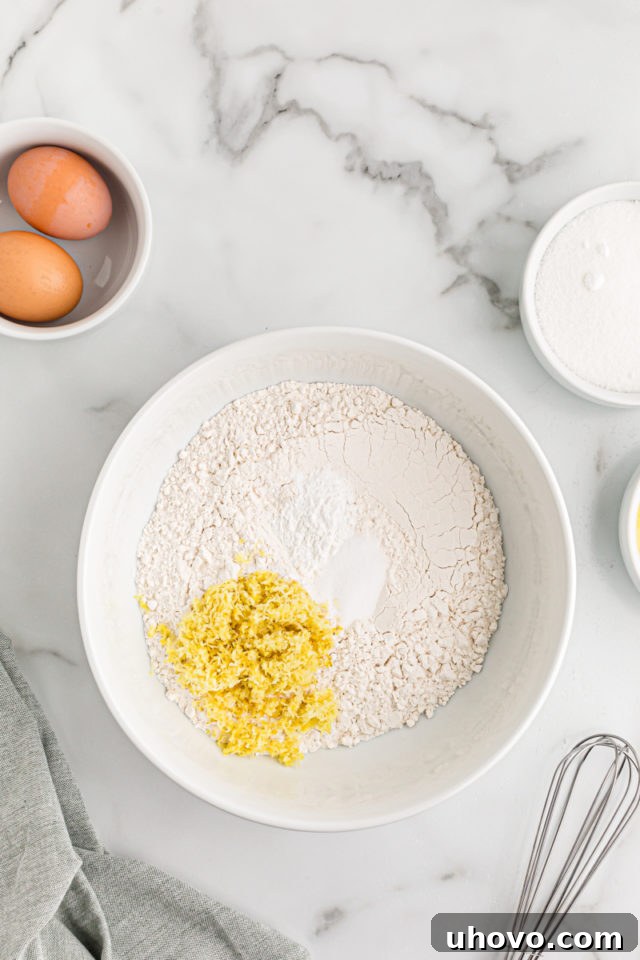 Overhead view of dry ingredients in mixing bowl before whisking