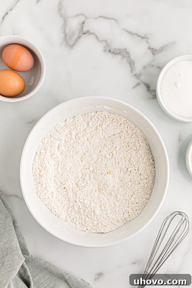 Overhead view of dry ingredients in mixing bowl