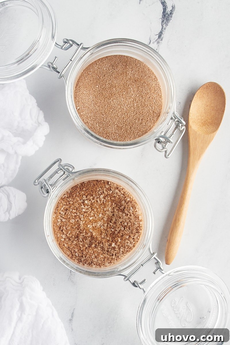 overhead view of two glass jars filled with cinnamon sugar
