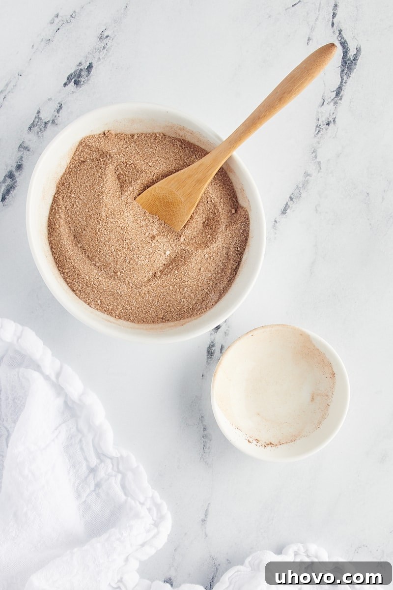 overhead view of mixed cinnamon sugar in a white bowl
