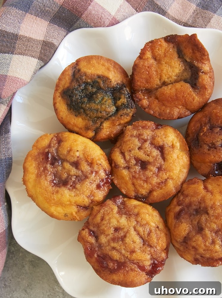 Raspberry Cream Cheese Buns are simple quick breads made with cream cheese and your favorite fruit preserves. A lovely breakfast treat or coffee companion! - Bake or Break