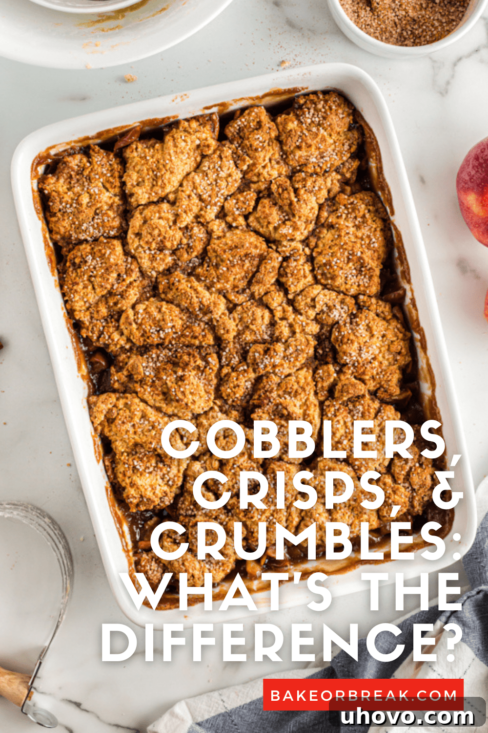 Assortment of fruit desserts: a cobbler, a crisp, and a crumble in various baking dishes