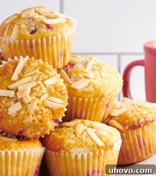 Red Currant Muffins piled on a white plate