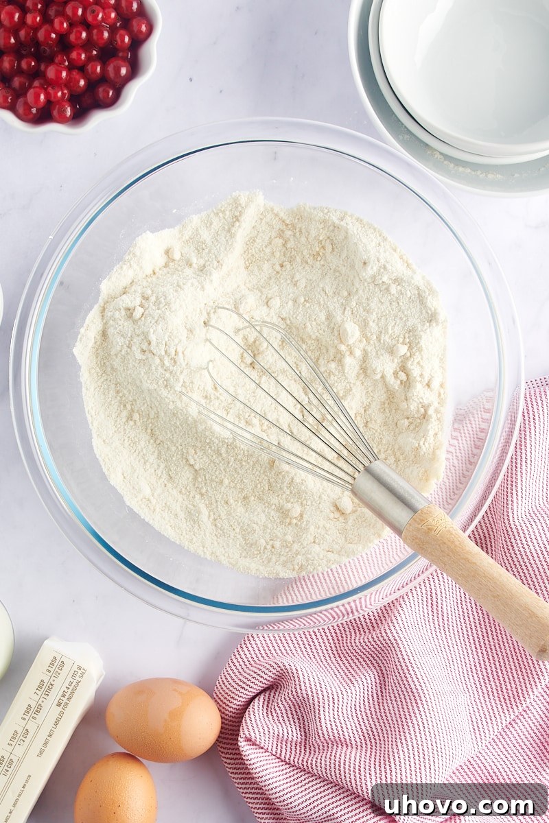 Mixed dry ingredients for Red Currant Muffins in a bowl