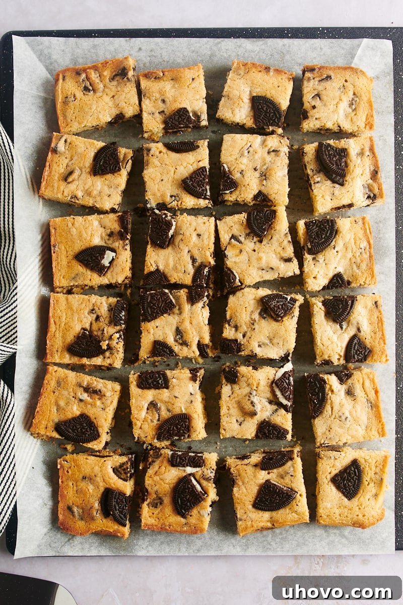 Overhead view of Cookies and Cream Blondies, perfectly baked and cut into uniform bars.