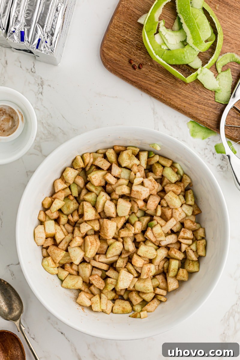 overhead view of mixed cinnamon apples for Caramel Apple Cheesecake Bars