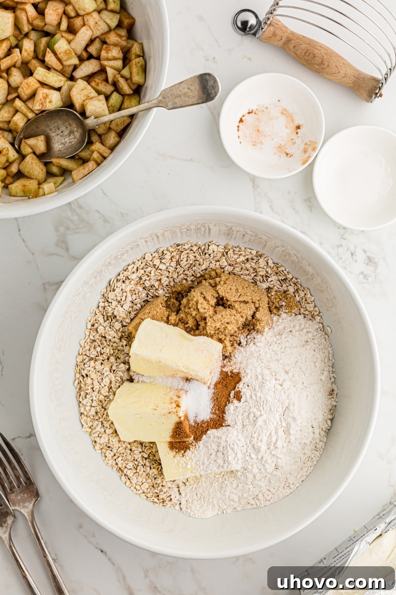 overhead view of streusel ingredients in a white mixing bowl