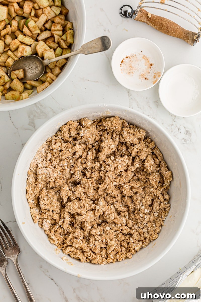 overhead view of mixed streusel topping in a white mixing bowl