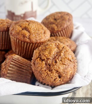 Gingerbread Muffins in a towel-lined white tray
