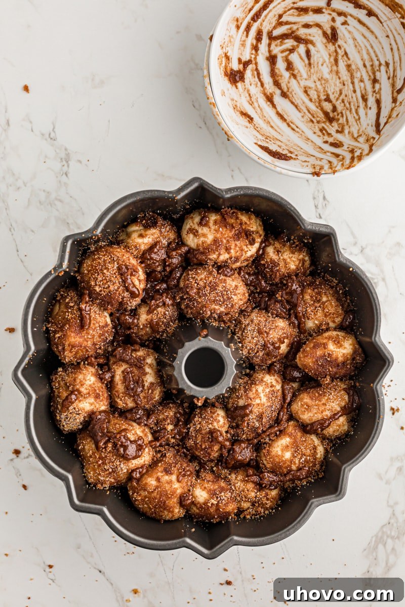 overhead view of Monkey Bread dough in a Bundt pan