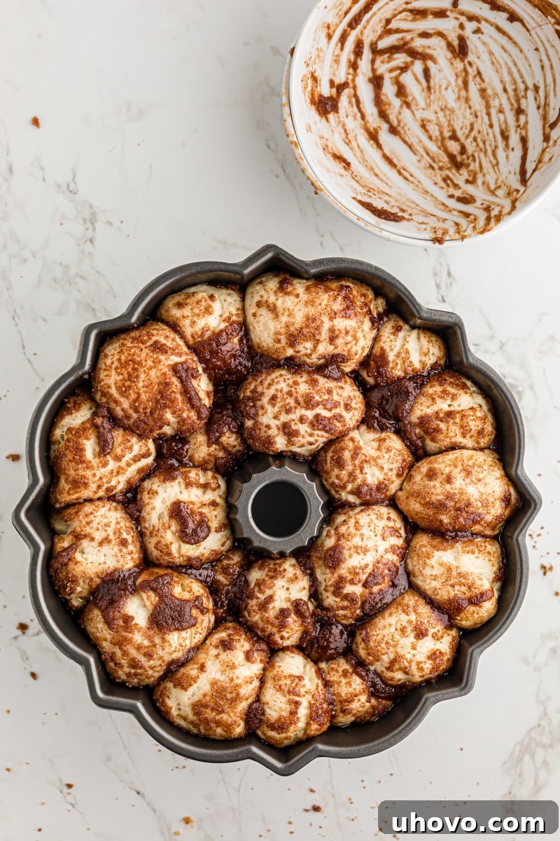 overhead view of Monkey Bread dough in a Bundt pan after an hour of rising
