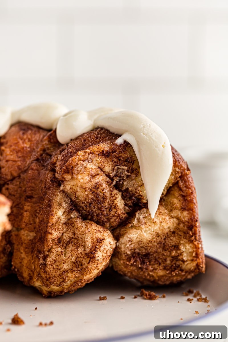 a large portion of Monkey Bread on a blue-rimmed white plate