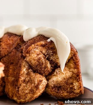 a large portion of Monkey Bread on a blue-rimmed white plate