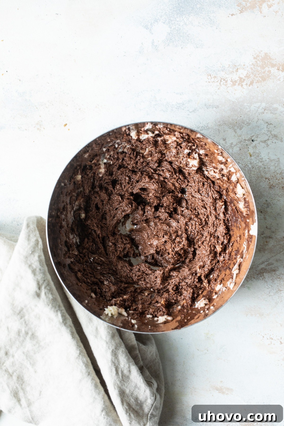 mixing bowl with cocoa cookie dough