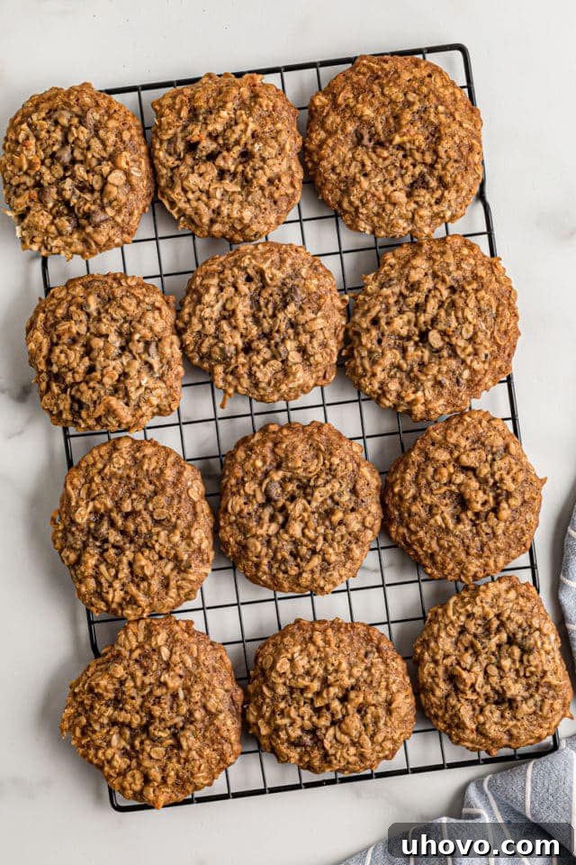 Overhead view of cowboy cookies cooling on wire rack