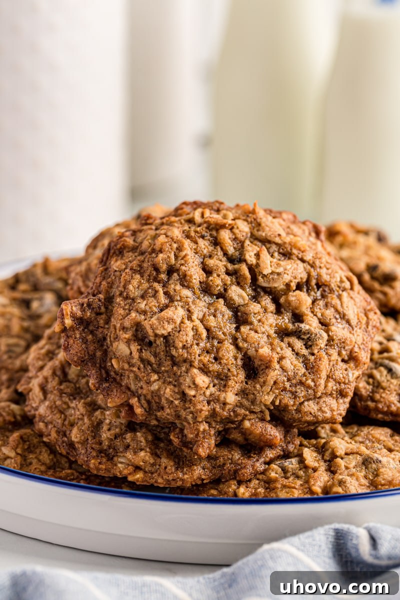 Stack of cowboy cookies on plate