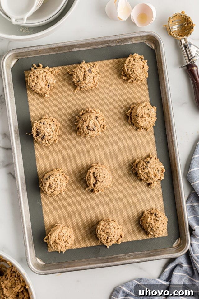 Cowboy cookie dough balls on baking sheet
