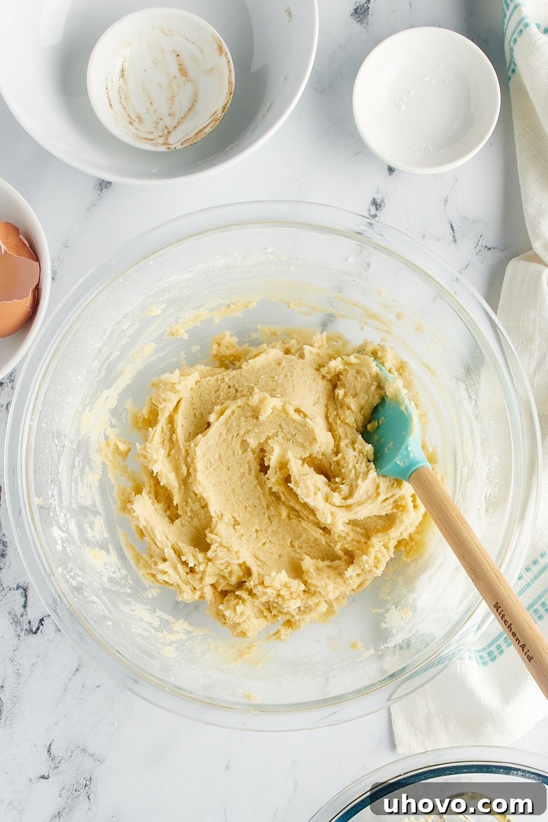 Overhead view of vanilla wafer dough in a glass mixing bowl.