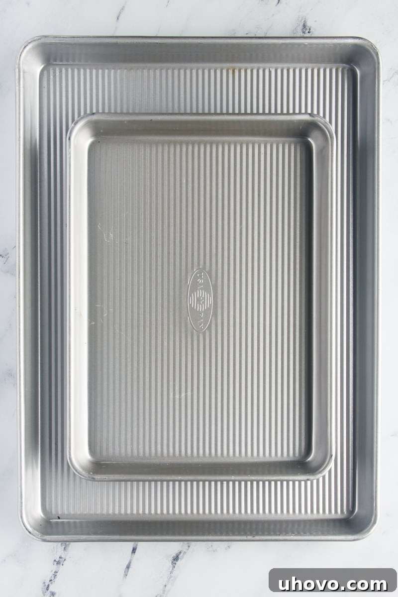 overhead view of a quarter sheet pan on top of a half sheet pan
