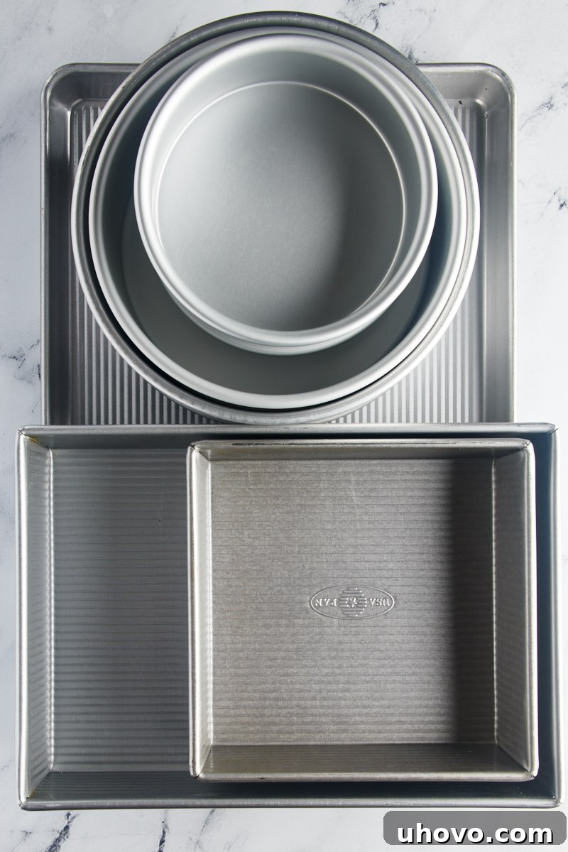 overhead view of a stack of a variety of baking pans 