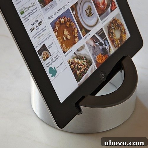 Williams-Sonoma Smart Tools Kitchen Stand for Tablets, holding a tablet displaying a recipe