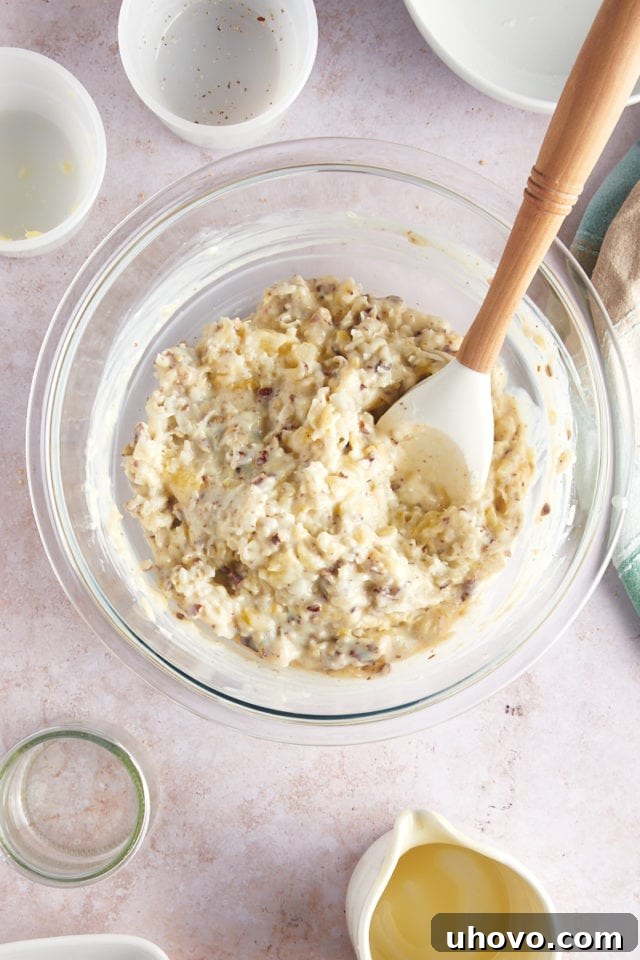 Overhead view of millionaire pie filling in glass bowl before adding whipped cream