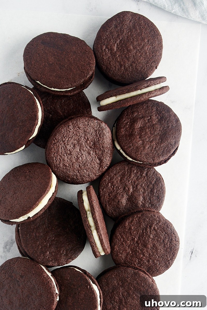 A delightful scattering of homemade Oreos on a pristine marble surface, showcasing their delicious appeal.