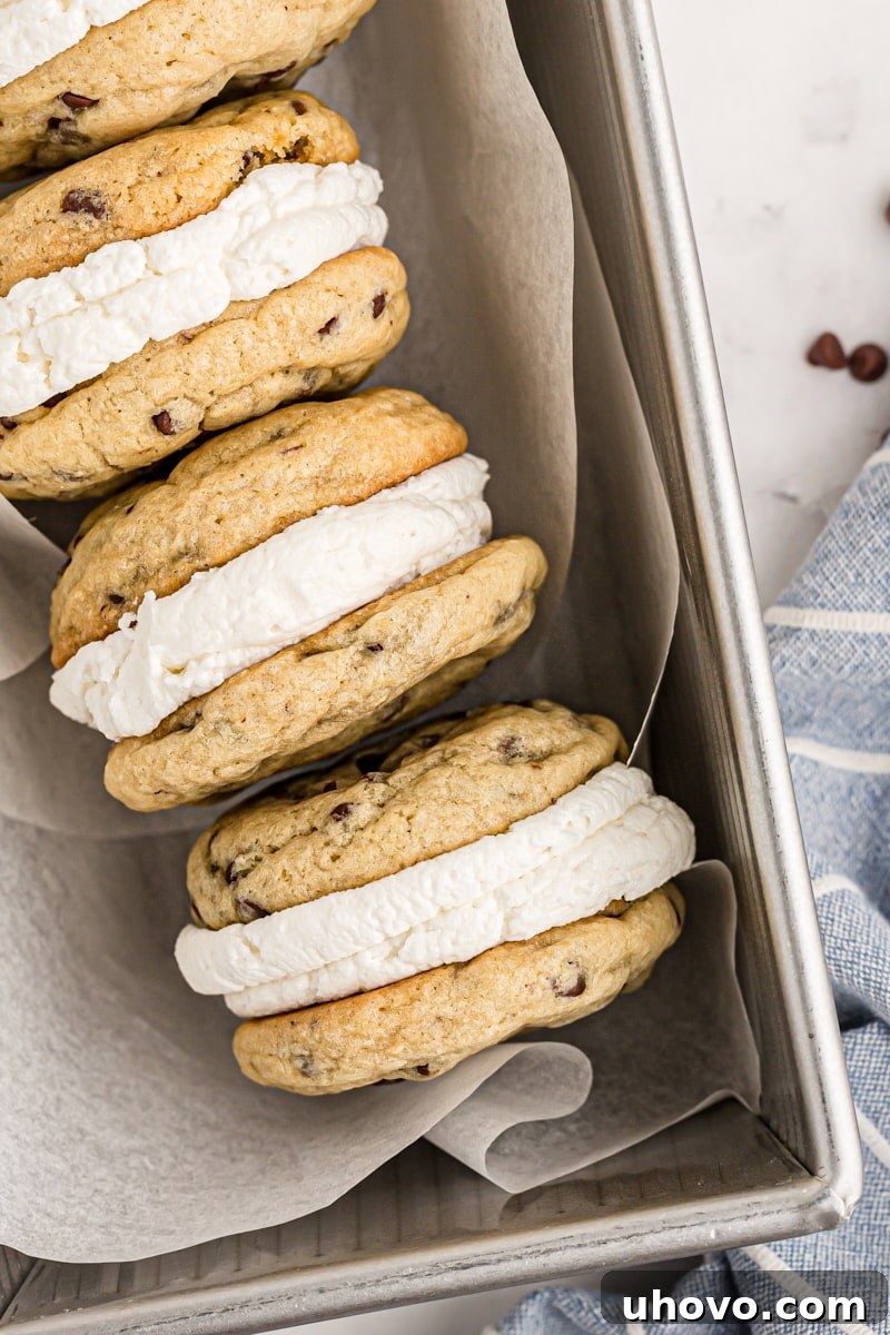 overhead view of three Chocolate Chip Cookie Sandwiches in a parchment-lined loaf pan