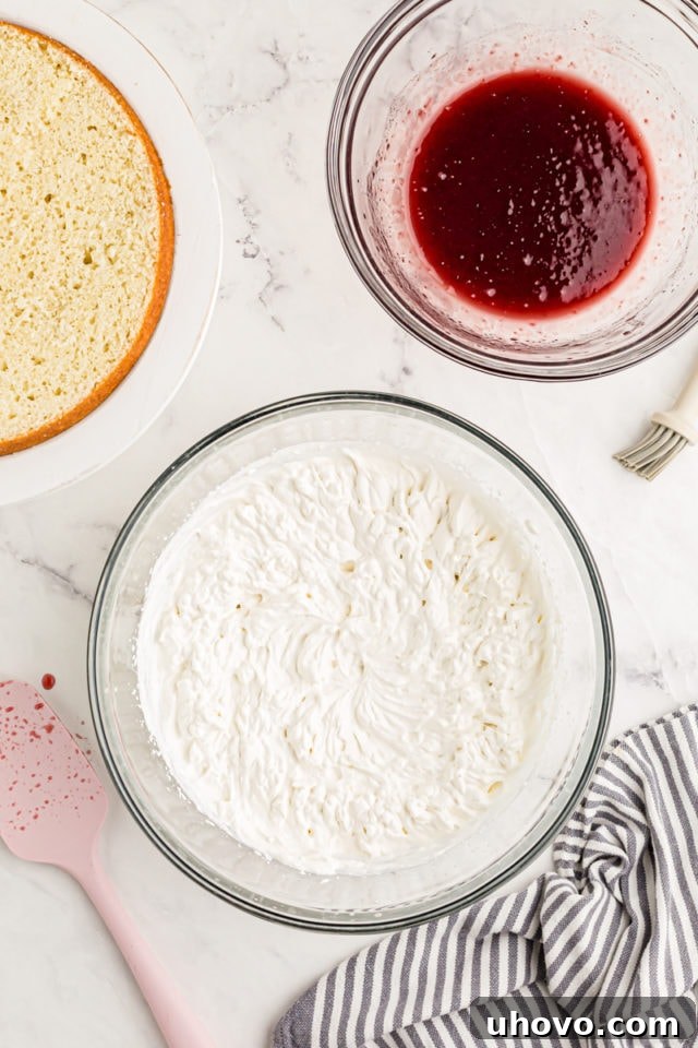 Overhead view of whipped cream in mixing bowl