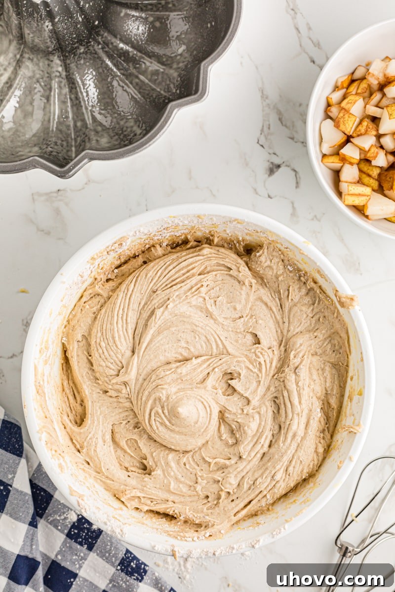 Fully mixed spiced pear cake batter