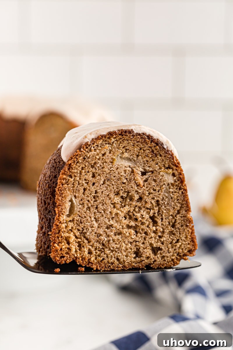 slice of Spiced Pear Cake on a cake server