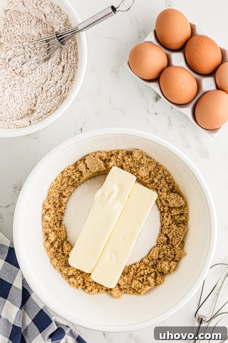 Butter, sugar, and brown suguar in a bowl