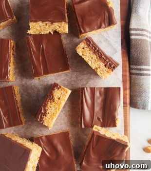 Scotcheroo squares on parchment-lined wooden board