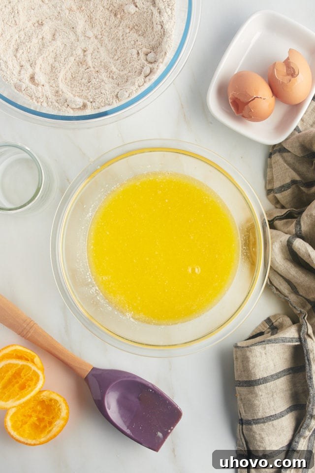 overhead view of mixed wet ingredients for date nut muffins